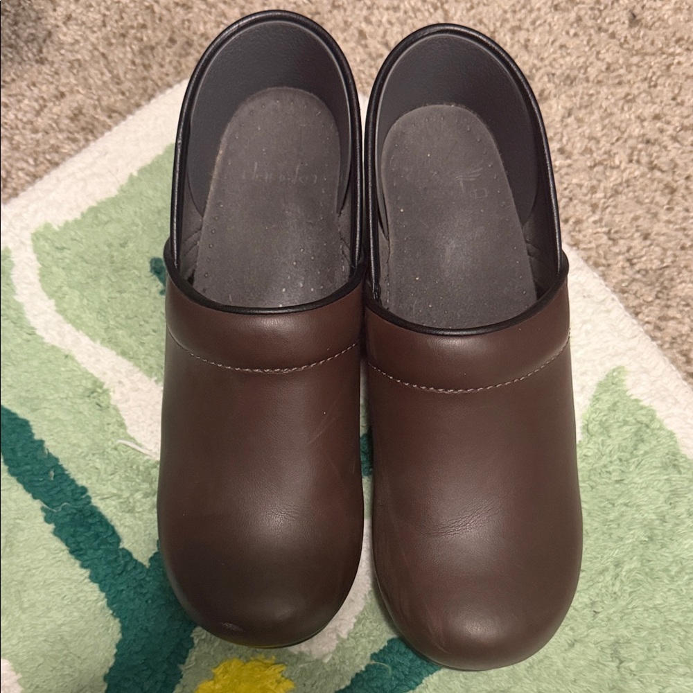 Dansko Women’s Chocolate Brown Slip-On Leather Clogs